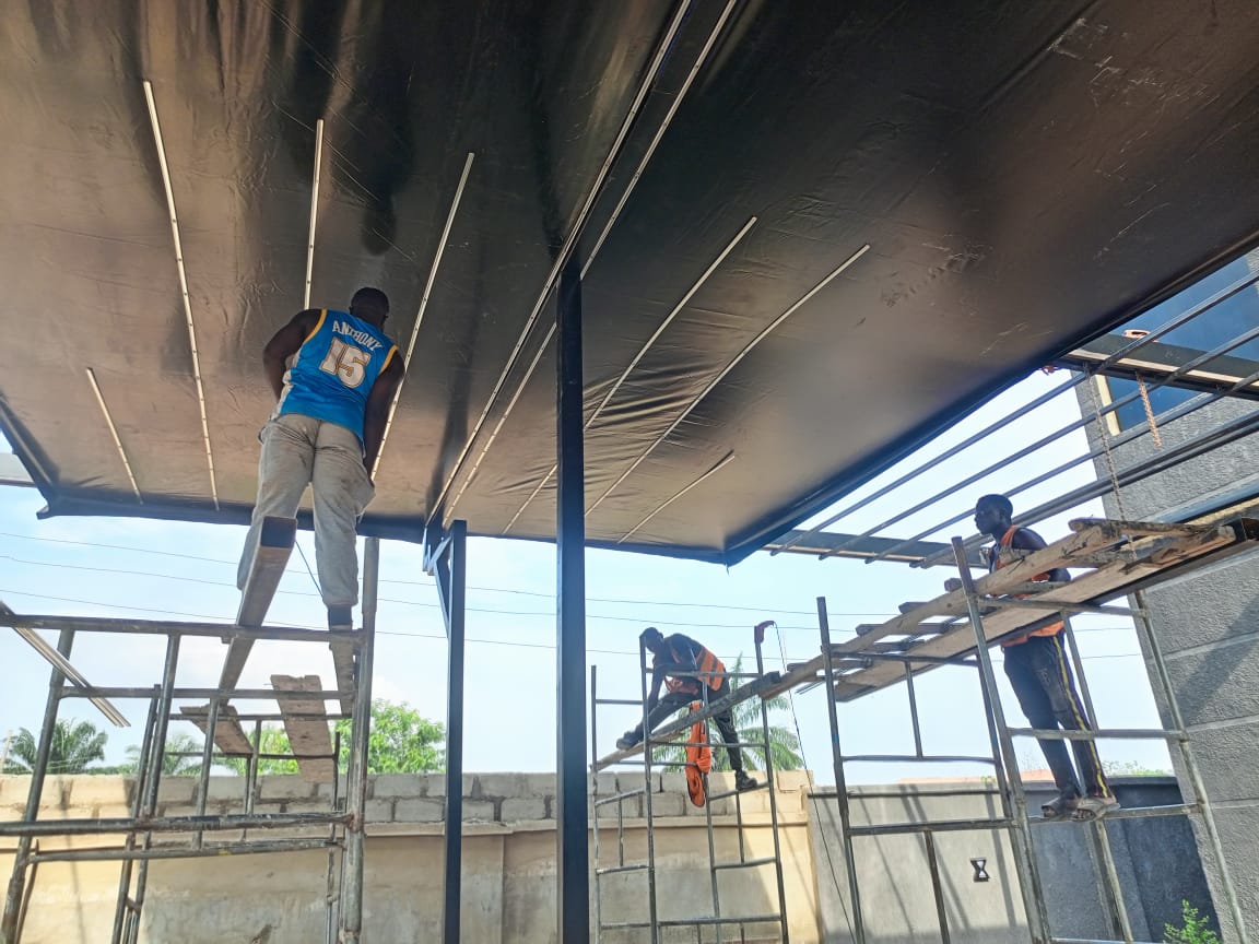 Team installing retractable roof