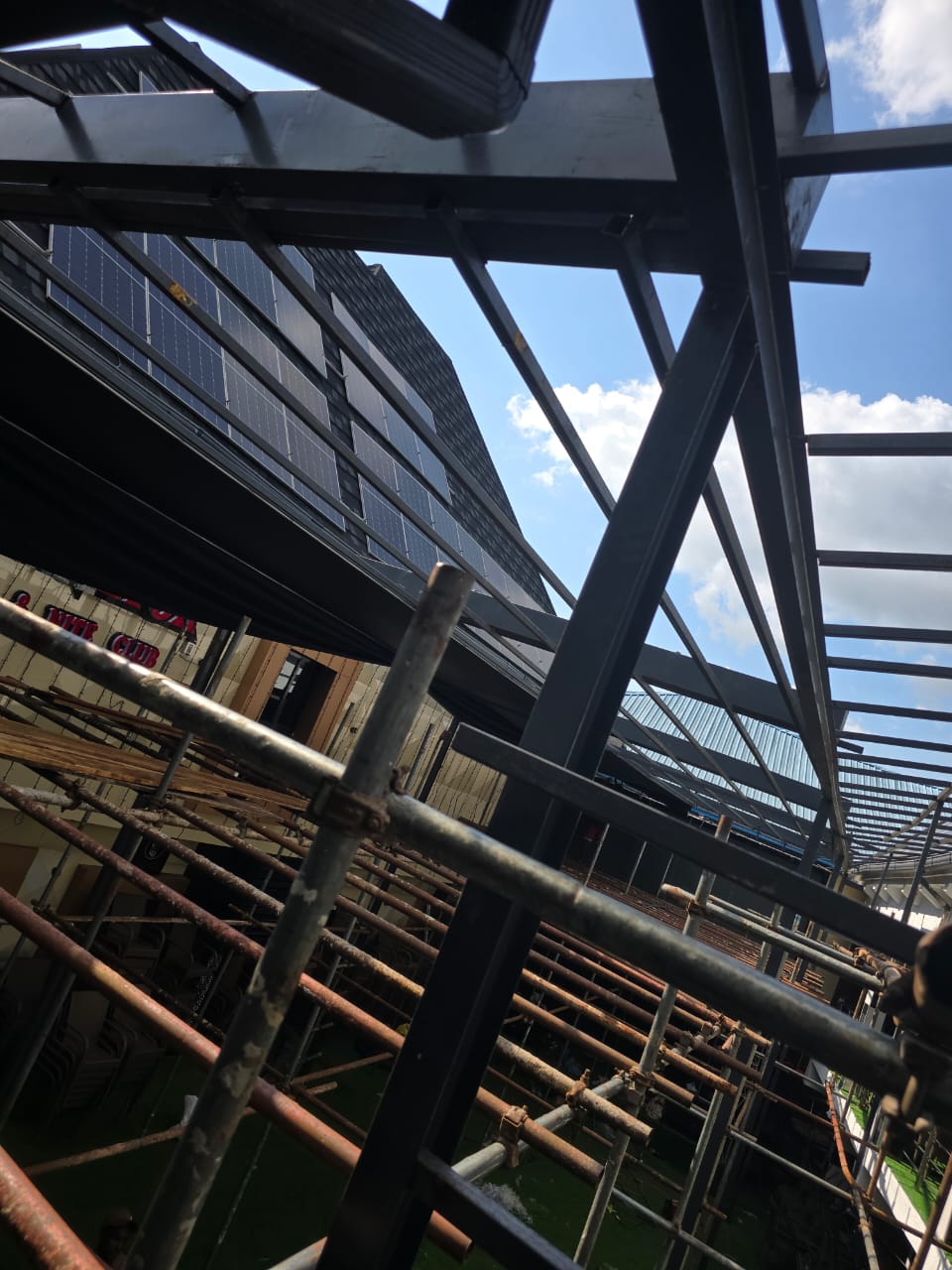 Large commercial retractable roof installation by Access Innovations
